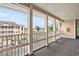 Balcony overlooking parking featuring views of exterior buildings and surrounding landscape at 1900 Duffy St. # H-8, North Myrtle Beach, SC 29582