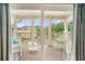 A charming balcony with wicker furniture offers a relaxing outdoor space at 1900 Duffy St. # H-8, North Myrtle Beach, SC 29582