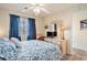 Inviting bedroom with blue accents, soft lighting, and coastal-inspired decor elements at 1900 Duffy St. # H-8, North Myrtle Beach, SC 29582