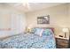 Bright bedroom with ceiling fan, closet and nautical decor offering a relaxing retreat at 1900 Duffy St. # H-8, North Myrtle Beach, SC 29582