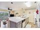 Well-lit kitchen featuring ample counter space, modern appliances, and seamless access to the living area at 1900 Duffy St. # H-8, North Myrtle Beach, SC 29582