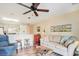 Comfortable living room with sofa, bar stools, and view into kitchen at 1900 Duffy St. # H-8, North Myrtle Beach, SC 29582