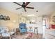 Inviting living area with cozy seating and a view of the breakfast bar and kitchen area at 1900 Duffy St. # H-8, North Myrtle Beach, SC 29582