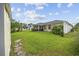 Lush, well-maintained backyard featuring a screened porch, storage shed, and ample green space at 208 Hamilton Way, Conway, SC 29526