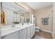 Spacious bathroom featuring double sinks, a large mirror, and ample counter space at 208 Hamilton Way, Conway, SC 29526