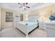Sunlit bedroom with white furniture and a bed with a nautical-themed comforter set at 208 Hamilton Way, Conway, SC 29526