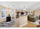 Open kitchen featuring stainless steel appliances, a breakfast bar, and tile floors at 208 Hamilton Way, Conway, SC 29526
