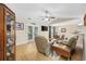 Bright living room featuring a tv and french doors that let in natural light at 208 Hamilton Way, Conway, SC 29526