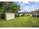 A practical storage shed in a well-maintained backyard, perfect for gardening tools and outdoor equipment at 208 Hamilton Way, Conway, SC 29526