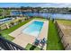 In-ground pool featuring a surrounding patio area, putting green, and waterway access at 208 W Palms Dr., Myrtle Beach, SC 29579