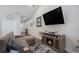 Comfortable living room featuring a fireplace, large television, and modern decor at 2472 Bayboro St. # C, Loris, SC 29569