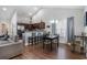 Bright living and dining area featuring an open-concept design with views to the kitchen at 2472 Bayboro St. # C, Loris, SC 29569