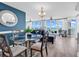 Elegant dining area with a round glass table and stunning ocean views, perfect for entertaining and everyday meals at 2500 N Ocean Blvd. # 1102, Myrtle Beach, SC 29577