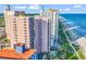 Exterior view of condos with ocean view, swimming pools, balconies, and direct beach access at 2500 N Ocean Blvd. # 1102, Myrtle Beach, SC 29577