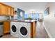 Open-concept kitchen featuring modern appliances and a breakfast bar overlooking the living area with ocean views at 2500 N Ocean Blvd. # 1102, Myrtle Beach, SC 29577