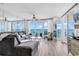 A stylish living room with ocean views and elegant furnishings, creating a comfortable and inviting space at 2500 N Ocean Blvd. # 1102, Myrtle Beach, SC 29577