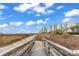 Inviting boardwalk leading to a beautiful beach with city views at 2500 N Ocean Blvd. # 1102, Myrtle Beach, SC 29577