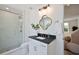 Bathroom with white vanity, gold hardware, marble shower, and decorative mirror at 2729 Long Avenue Ext., Conway, SC 29526