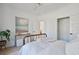Bright bedroom features a decorative bed, light-colored bedding, and neutral wall decor at 2729 Long Avenue Ext., Conway, SC 29526