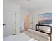 Bright bedroom with ceiling fan, light wood floors, and a picture frame television at 2729 Long Avenue Ext., Conway, SC 29526
