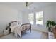 Cozy bedroom with decorative bed, large windows, and ample natural light at 2729 Long Avenue Ext., Conway, SC 29526
