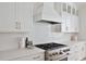 Close up of the kitchen featuring stainless appliances and custom white cabinetry at 2729 Long Avenue Ext., Conway, SC 29526