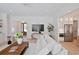 Open-concept living room seamlessly connects to the dining area, featuring modern decor and ample seating at 2729 Long Avenue Ext., Conway, SC 29526