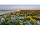 Aerial view showing the property's location near the ocean and nestled among lush greenery at 309 Sunset Trail, Myrtle Beach, SC 29577