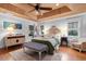 Tranquil main bedroom featuring soft lighting, wood ceiling, and cozy decor for a restful sanctuary at 309 Sunset Trail, Myrtle Beach, SC 29577
