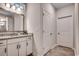Bathroom featuring a granite countertop vanity with a decorative mirror and tiled floors at 3091 Viceroy Loop, Little River, SC 29566