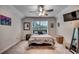 Comfortable bedroom with ceiling fan, large window, and closet with a modern aesthetic at 3091 Viceroy Loop, Little River, SC 29566