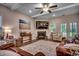 Cozy living room with hardwood floors, fireplace, and decorative accents create a welcoming atmosphere at 3091 Viceroy Loop, Little River, SC 29566