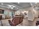 Spacious living room featuring hardwood floors, fireplace, and open floor plan to kitchen at 3091 Viceroy Loop, Little River, SC 29566