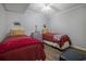 Bedroom featuring two twin beds, wood floors, and nautical decor at 310 Marsh Pl. # 108, Murrells Inlet, SC 29576