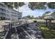 Outdoor picnic tables with charcoal grill available for residents at 310 Marsh Pl. # 108, Murrells Inlet, SC 29576