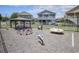 Community playground featuring a variety of play structures for entertainment at 310 Marsh Pl. # 108, Murrells Inlet, SC 29576