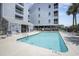 Exterior view of sparkling swimming pool and lounge area at the community at 310 Marsh Pl. # 108, Murrells Inlet, SC 29576