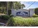 Elegant brick sign for Salters Cove surrounded by lush greenery at 310 Marsh Pl. # 108, Murrells Inlet, SC 29576