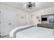 Comfortable bedroom with neutral tones, featuring a ceiling fan and well-lit space at 3129 Palma Way, Myrtle Beach, SC 29579