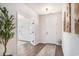 Bright foyer with hardwood floors, a front door, and decorative accents at 3129 Palma Way, Myrtle Beach, SC 29579