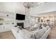 Inviting living room with fireplace, built-ins, and views into kitchen and dining areas at 3129 Palma Way, Myrtle Beach, SC 29579