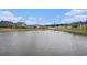 Scenic view of the pond surrounded by well-maintained lawns of neighborhood homes at 3129 Palma Way, Myrtle Beach, SC 29579