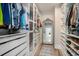 Spacious walk-in closet features custom shelving, drawers, and a full length mirror at 3129 Palma Way, Myrtle Beach, SC 29579