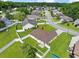 An aerial view of a home with a fenced in backyard and a lush green lawn in a neighborhood at 316 Watercress Dr., Longs, SC 29568