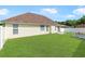 This backyard has green grass, a white fence and a wooden planter off to the side at 316 Watercress Dr., Longs, SC 29568