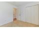 This bright bedroom features neutral carpeting and a double door closet for plenty of storage at 316 Watercress Dr., Longs, SC 29568
