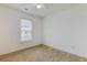 Bedroom featuring neutral carpet, natural light from a window, and a ceiling fan at 316 Watercress Dr., Longs, SC 29568