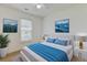 Bedroom with a cozy bed, scenic wall art, and natural light from a window at 316 Watercress Dr., Longs, SC 29568