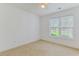 Bedroom with neutral carpet, ample natural light, and a ceiling fan at 316 Watercress Dr., Longs, SC 29568