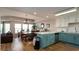 Open-concept dining room with large windows and modern lighting at 3401 N Ocean Blvd. # 302, North Myrtle Beach, SC 29582